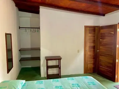 Cama o camas de una habitación en Cabaña Mangos