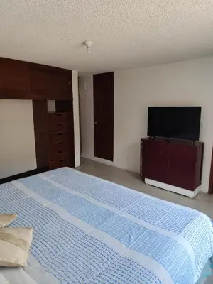 Cama o camas de una habitación en Departamento D-4