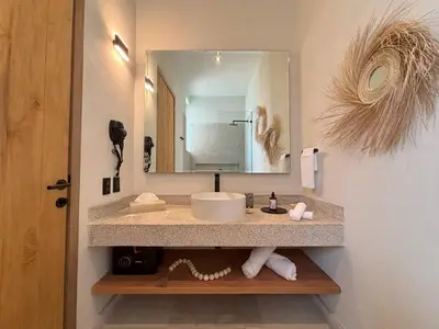 Un baño de ÚNICO LA PUNTA HOTEL BOUTIQUE Beach club