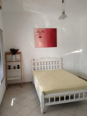 Cama o camas de una habitación en Recámara amueblada en casa