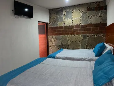 Cama o camas de una habitación en Sendero de San Francisco