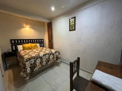 Cama o camas de una habitación en Sendero de San Francisco