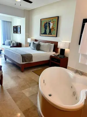 Cama o camas de una habitación en Grand Ocean Breeze Acapulco