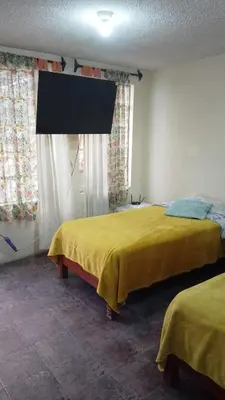 Cama o camas de una habitación en Departamento C-3