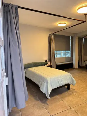 Cama o camas de una habitación en Habitación unos pasos de estadio GNP foro sol