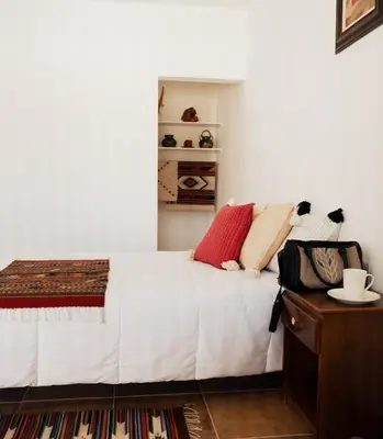 Cama o camas de una habitación en Hotel del Pueblo