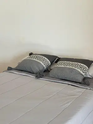 Cama o camas de una habitación en Hotel del Pueblo