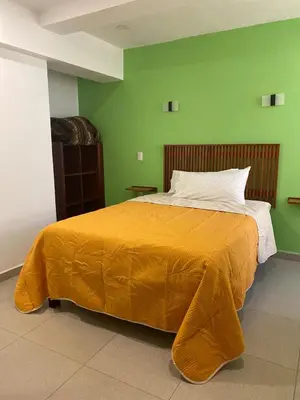Cama o camas de una habitación en La Casa de los Abuelos