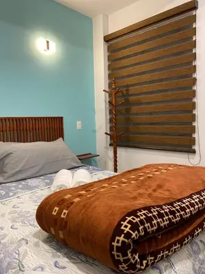 Cama o camas de una habitación en La Casa de los Abuelos