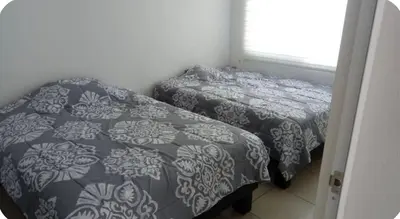 Cama o camas de una habitación en Residencial Yecapixtla