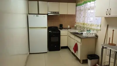 Una cocina o zona de cocina en Departamento A1