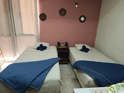 Cama o camas de una habitación en Habitación 102 Cordoba Centro Estacionamiento