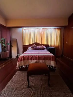 Cama o camas de una habitación en Casa Carmesí