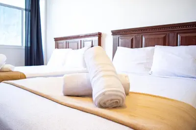 Cama o camas de una habitación en Hotel Catedral Jojutla