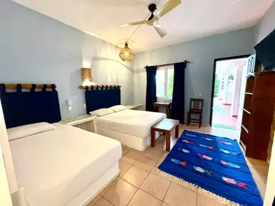 Cama o camas de una habitación en BEACH HOTEL INES en Zicatela