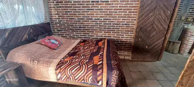 Cama o camas de una habitación en Hospedaje Migue y Cata y Centro Holístico Kuatlicue