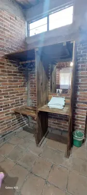Un baño de Hospedaje Migue y Cata y Centro Holístico Kuatlicue