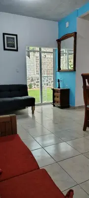 Zona de estar de Casa Palmer, con gran jardín
