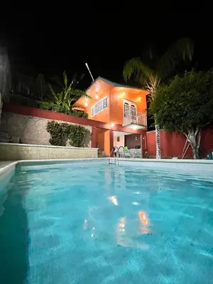 Piscina en o cerca de Bonita casa con alberca en Mazatepec, Morelos