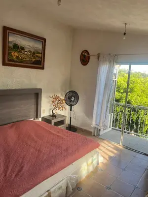 Cama o camas de una habitación en Bonita casa con alberca en Mazatepec, Morelos