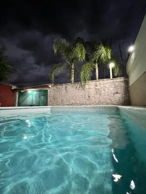 Piscina en o cerca de Bonita casa con alberca en Mazatepec, Morelos