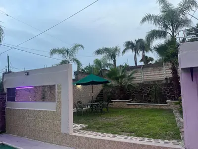 Jardín al aire libre en Bonita casa con alberca en Mazatepec, Morelos