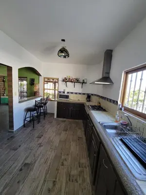 Una cocina o zona de cocina en Casa Grande con Alberca en San Gaspar