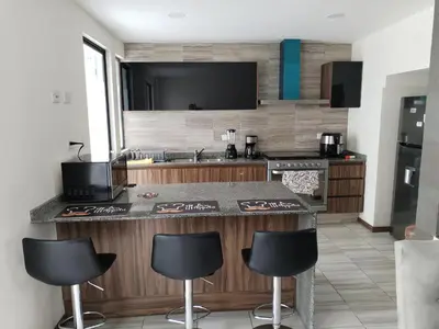 Una cocina o zona de cocina en CASA MODERNA y SEMINUEVA EN RESIDENCIAL PRIVADO y TRANQUILO