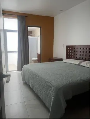 Cama o camas de una habitación en Departamento WOLF