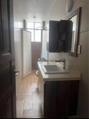 Una cocina o zona de cocina en Departamento WOLF