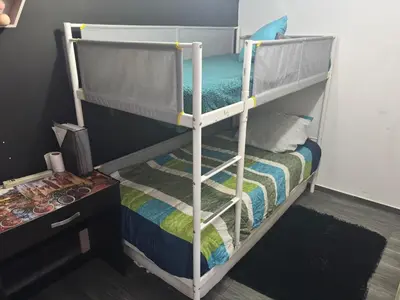 Cama o camas de una habitación en Departamento a 5 minutos del Estadio GNP