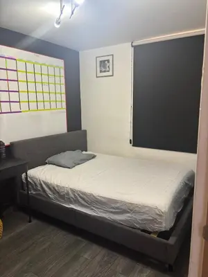 Cama o camas de una habitación en Departamento a 5 minutos del Estadio GNP