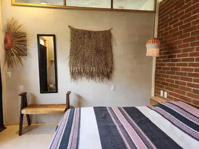 Cama o camas de una habitación en Amixtli