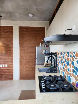 Una cocina o zona de cocina en Amixtli