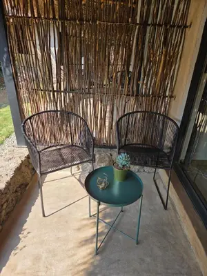 Un patio o zona al aire libre en Casa Nuestra Hotel Boutique y Experiencias para Compartir