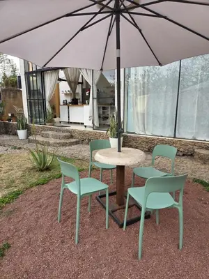 Un patio o zona al aire libre en Casa Nuestra Hotel Boutique y Experiencias para Compartir