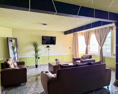 Una televisión o centro de entretenimiento en Residence in Chignahuapan