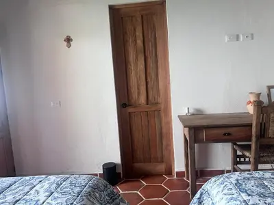 Cama o camas de una habitación en Hotel Boutique Casa Xicotl