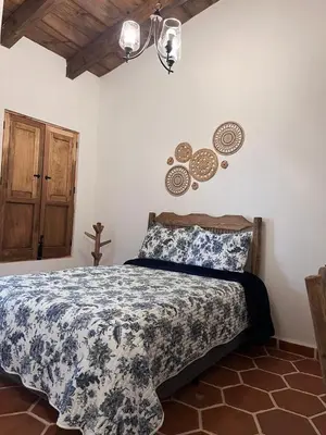 Cama o camas de una habitación en Hotel Boutique Casa Xicotl