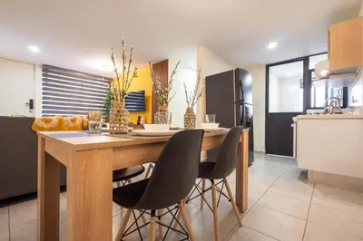 Una cocina o zona de cocina en Apto a Pasos del GNP y Aeropuerto