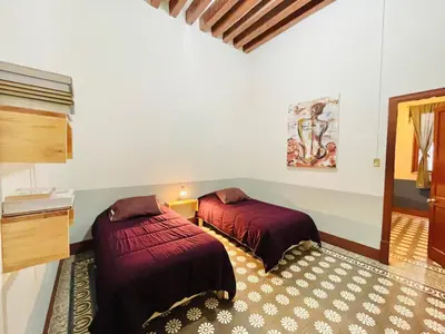 Cama o camas de una habitación en Departamento en casona del siglo XVI frente al Zócalo de Puebla #5