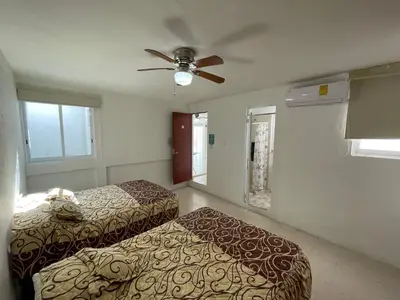 Cama o camas de una habitación en Casa Blanca