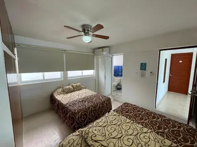 Cama o camas de una habitación en Casa Blanca