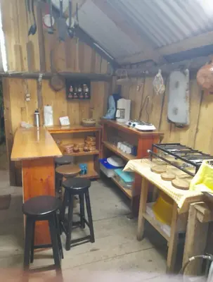 Una cocina o zona de cocina en Cabaña El Remanso