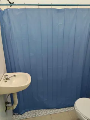 Un baño de Mini departamento céntrico