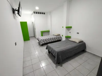 Cama o camas de una habitación en Mini departamento céntrico