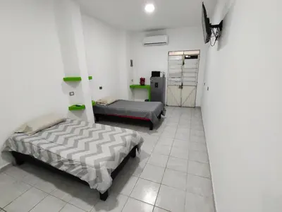 Cama o camas de una habitación en Mini departamento céntrico