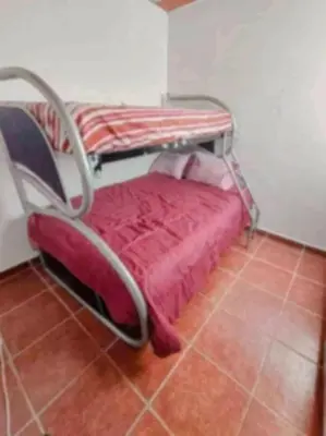 Cama o camas de una habitación en Las mejores vacaciones en Paraíso Diamante