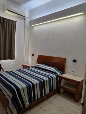 Cama o camas de una habitación en Hotel Coatza Inn