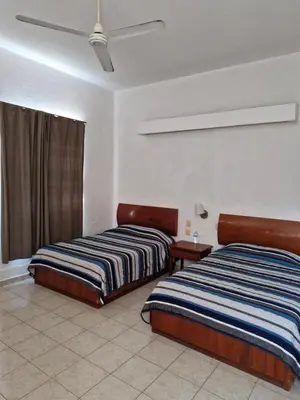 Cama o camas de una habitación en Hotel Coatza Inn